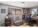 Home office with desk, chair, and bookshelves at 4902 W Cypress St, Phoenix, AZ 85035