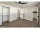 Bedroom with hardwood floors, closet, and ensuite bathroom at 538 N 74Th St, Scottsdale, AZ 85257