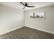 Bright bedroom featuring wood-look floors and ceiling fan at 538 N 74Th St, Scottsdale, AZ 85257