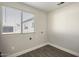 Laundry room with wood-look floors and window at 538 N 74Th St, Scottsdale, AZ 85257