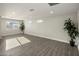 Bright and airy living room with hardwood floors and large windows at 538 N 74Th St, Scottsdale, AZ 85257