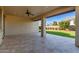 Covered patio with tile flooring, offering backyard views at 5720 S Wildrose --, Mesa, AZ 85212