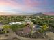 Aerial view of a single-story home with a pool and mountain views at 5730 E Cielo N Run, Cave Creek, AZ 85331