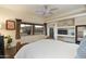 Serene bedroom with wooden bed frame and scenic window view at 5730 E Cielo N Run, Cave Creek, AZ 85331