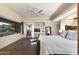 Bright bedroom featuring a wooden bed frame and scenic window at 5730 E Cielo N Run, Cave Creek, AZ 85331