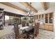 Elegant dining room with a rustic wood table and built-in cabinetry at 5730 E Cielo N Run, Cave Creek, AZ 85331