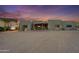 Exterior view of a home with a covered carport and desert landscaping at 5730 E Cielo N Run, Cave Creek, AZ 85331