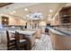 Modern kitchen with light wood cabinets, large island, and stainless steel appliances at 5730 E Cielo N Run, Cave Creek, AZ 85331