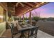 Covered patio with outdoor dining set and desert views at 5730 E Cielo N Run, Cave Creek, AZ 85331