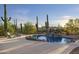 Relaxing pool area with waterfall feature and mountain views at 5730 E Cielo N Run, Cave Creek, AZ 85331