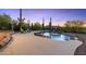 Inviting pool with waterfall feature and desert landscape at 5730 E Cielo N Run, Cave Creek, AZ 85331