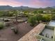 Landscaped yard with tile patio and mountain views at 5730 E Cielo N Run, Cave Creek, AZ 85331