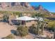 Single story home with mountain views and desert landscaping at 6013 E Lost Dutchman Blvd, Apache Junction, AZ 85119