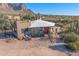 Single story home with mountain views and desert landscaping at 6013 E Lost Dutchman Blvd, Apache Junction, AZ 85119