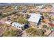 An aerial view of a house with a large RV and a desert landscape at 6013 E Lost Dutchman Blvd, Apache Junction, AZ 85119