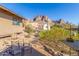 Landscaped backyard with seating and mountain views at 6013 E Lost Dutchman Blvd, Apache Junction, AZ 85119