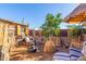 Unique backyard with rustic shed and seating areas at 6013 E Lost Dutchman Blvd, Apache Junction, AZ 85119