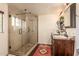 Bathroom boasts a large glass shower and double vanity at 6013 E Lost Dutchman Blvd, Apache Junction, AZ 85119