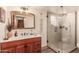 Second bathroom with walk-in shower and wooden vanity at 6013 E Lost Dutchman Blvd, Apache Junction, AZ 85119