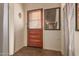 Inviting entryway with wooden door and tile flooring at 6013 E Lost Dutchman Blvd, Apache Junction, AZ 85119