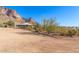 House exterior showcasing desert landscaping and mountain views at 6013 E Lost Dutchman Blvd, Apache Junction, AZ 85119