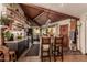 Modern kitchen with dark cabinets and farmhouse sink at 6013 E Lost Dutchman Blvd, Apache Junction, AZ 85119