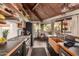 Stylish kitchen with dark cabinetry and wood accents at 6013 E Lost Dutchman Blvd, Apache Junction, AZ 85119