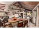 Rustic kitchen with wooden countertops, open shelving, and unique lighting at 6013 E Lost Dutchman Blvd, Apache Junction, AZ 85119