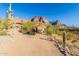 Designated RV area with shade cover, nestled in desert landscape at 6013 E Lost Dutchman Blvd, Apache Junction, AZ 85119