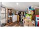 Neat storage room with shelving and refrigerator at 6013 E Lost Dutchman Blvd, Apache Junction, AZ 85119