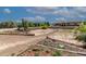 Aerial view showcasing a home's expansive backyard and landscaping at 6052 N 183Rd Ave, Waddell, AZ 85355