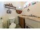 Simple bathroom with toilet and sink vanity at 6052 N 183Rd Ave, Waddell, AZ 85355