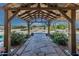 Covered walkway with flagstone path leading to open space at 6052 N 183Rd Ave, Waddell, AZ 85355