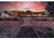 Home exterior with steps leading to the backyard at 6052 N 183Rd Ave, Waddell, AZ 85355