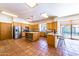 Modern kitchen with stainless steel appliances and island at 6052 N 183Rd Ave, Waddell, AZ 85355