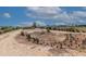 Expansive desert landscape with unique rock features at 6052 N 183Rd Ave, Waddell, AZ 85355