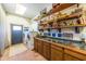 Laundry room with washer, dryer, and ample storage shelving at 6052 N 183Rd Ave, Waddell, AZ 85355