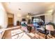 Living room with fireplace, large windows, and comfortable seating at 6052 N 183Rd Ave, Waddell, AZ 85355