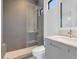 Modern bathroom with a walk-in shower and gray tile at 6147 E Alta Hacienda Dr, Scottsdale, AZ 85251