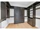 Large walk-in closet with custom shelving and drawers at 6147 E Alta Hacienda Dr, Scottsdale, AZ 85251