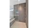 Walk-in shower with modern tile and built-in bench seat at 6147 E Alta Hacienda Dr, Scottsdale, AZ 85251