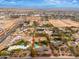 Aerial view of house, pool, and surrounding landscape at 6319 N Mockingbird Ln, Paradise Valley, AZ 85253