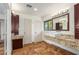 Bathroom with granite countertops and double vanity at 6319 N Mockingbird Ln, Paradise Valley, AZ 85253