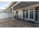 Covered patio with table and chairs, perfect for outdoor dining at 6622 N 43Rd Ave, Glendale, AZ 85301