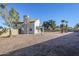 Two-story house with backyard and mature trees at 669 S Saddle St, Gilbert, AZ 85233