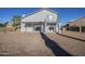 Two-story house with balcony and desert landscaping at 669 S Saddle St, Gilbert, AZ 85233