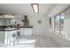 Modern kitchen with white cabinets, granite counters, and island at 669 S Saddle St, Gilbert, AZ 85233