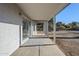 Covered patio with concrete flooring, adjacent to the house at 669 S Saddle St, Gilbert, AZ 85233