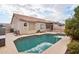 Relaxing backyard oasis featuring a sparkling pool and patio at 7138 E Laguna Azul Ave, Mesa, AZ 85209