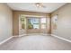 Bright bedroom with bay window and laminate flooring at 7138 E Laguna Azul Ave, Mesa, AZ 85209